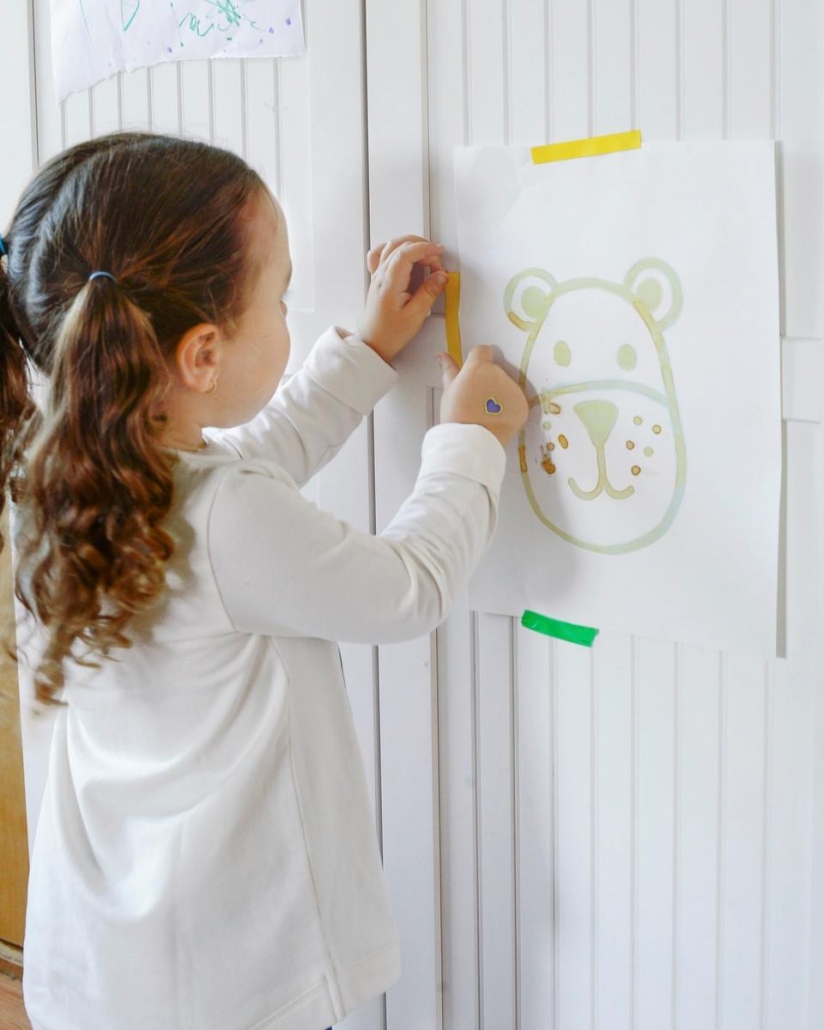 child learning to do fall crafts