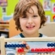 preschooler using an abacus