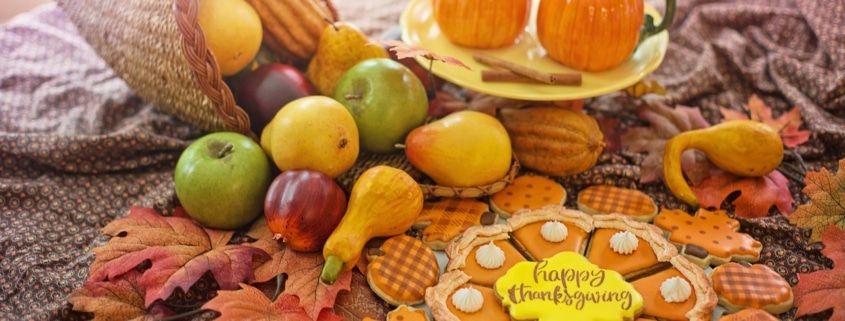 thanksgiving spread with cookies and pumpkin spice beverage