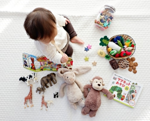 toddlers with toys for imaginative play