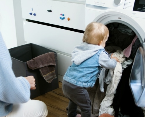 young girl doing chores for kids