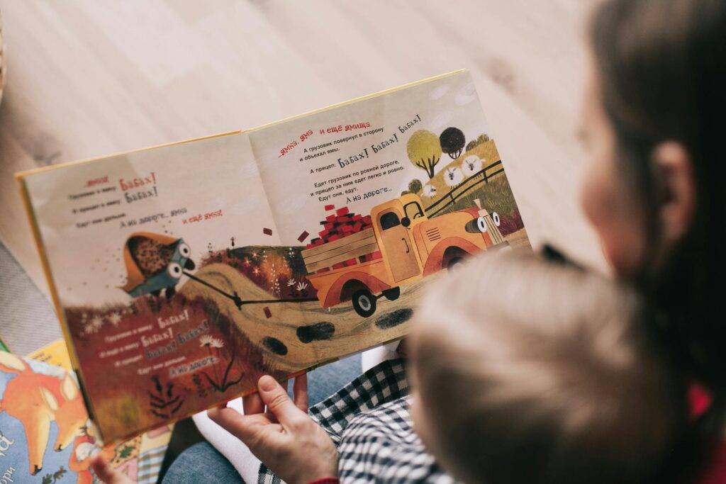 Mother reading a storybook to her child