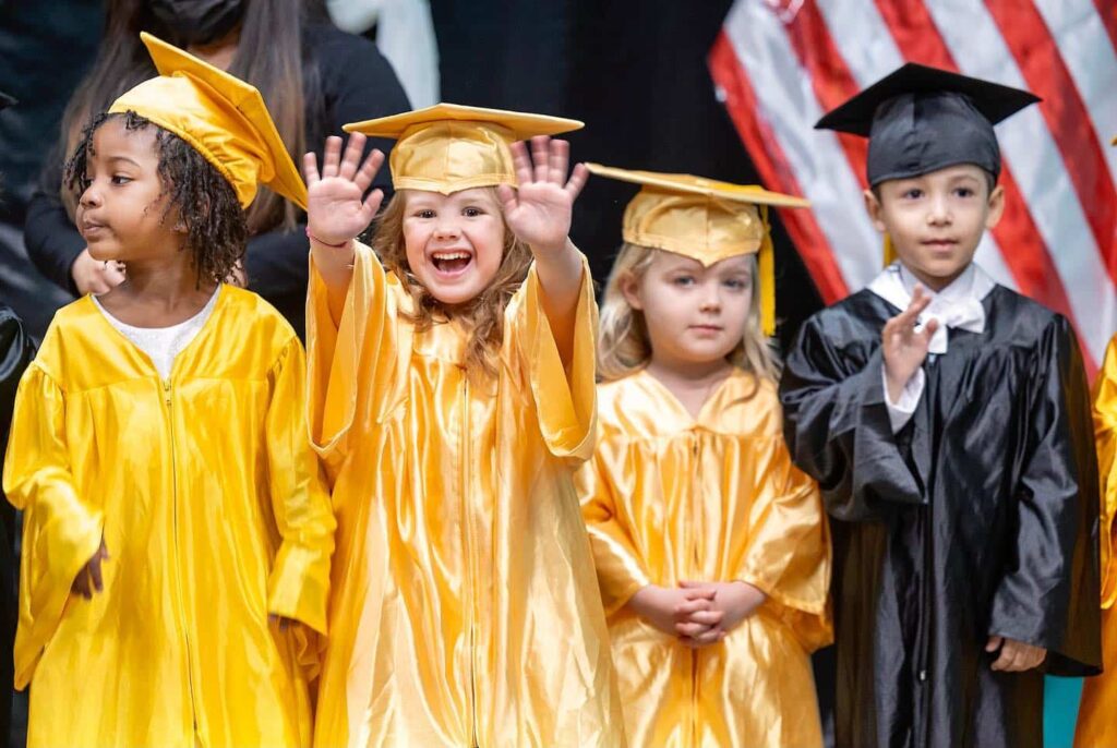 Toddlers wearing togas